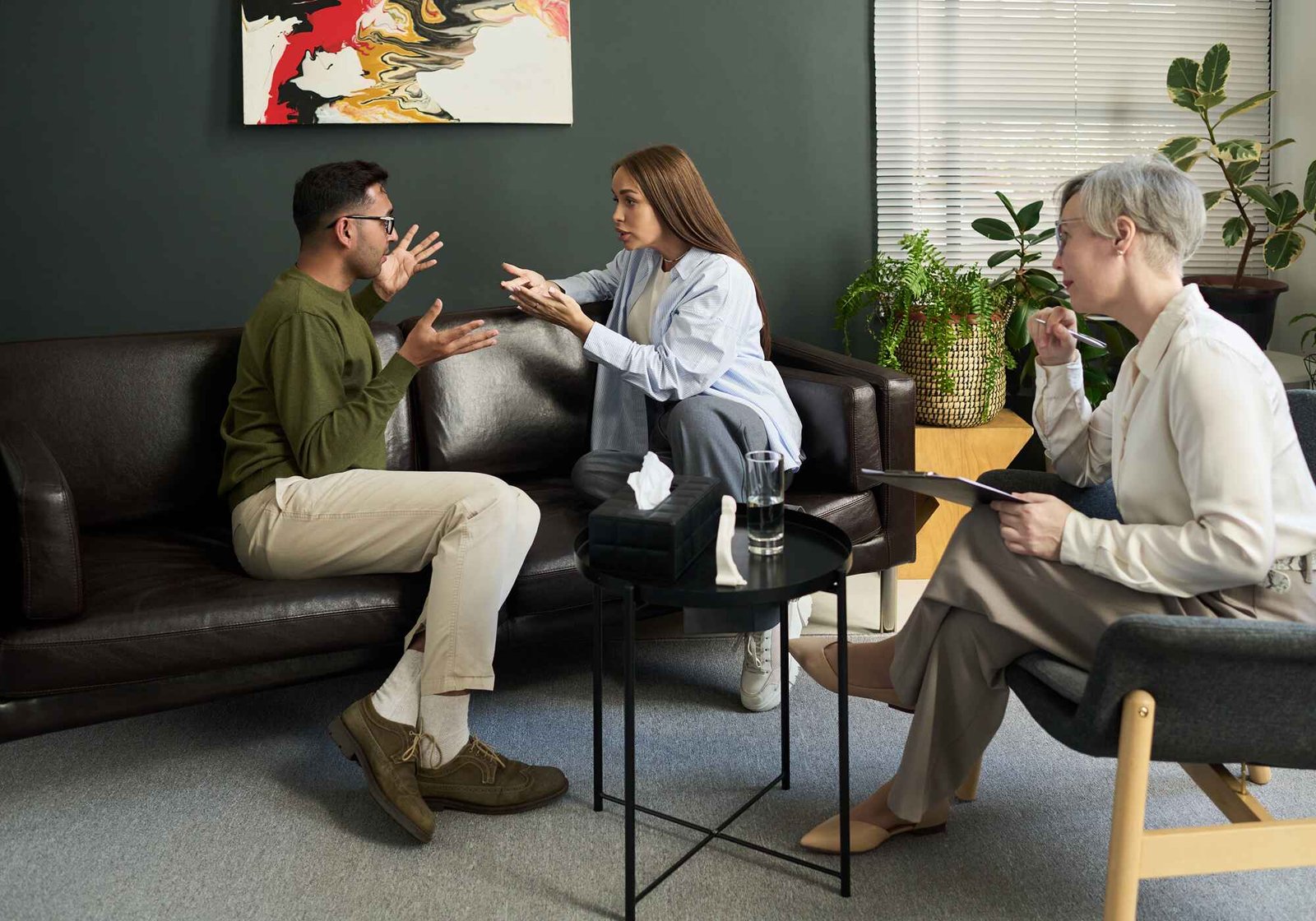 female-psychologist-observing-young-adult-couple-d-SNYDKV2.jpg